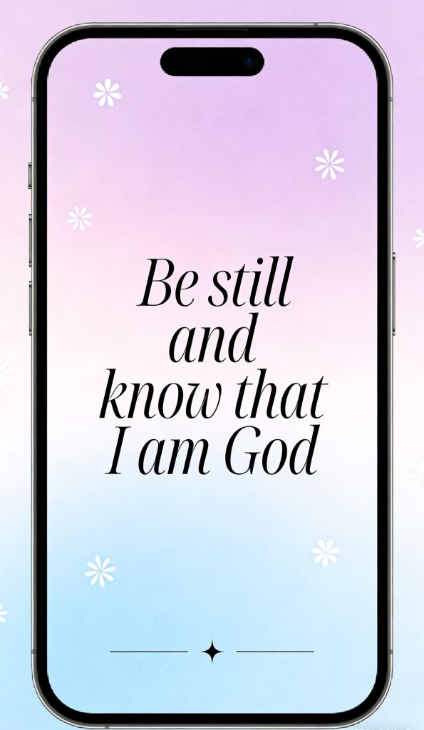 A smartphone with a gradient pastel background displays the text, Be still and know that I am God, in elegant black font. Small white flower icons are scattered around the screen.